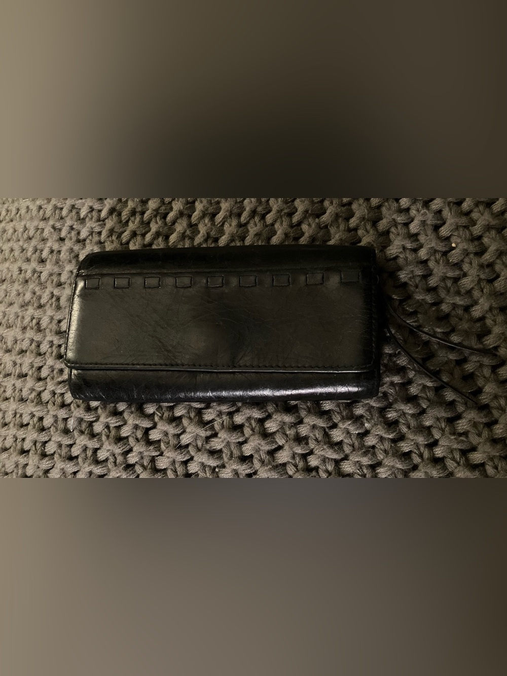 Hobo International Rider clutch wallet with a floral print interior